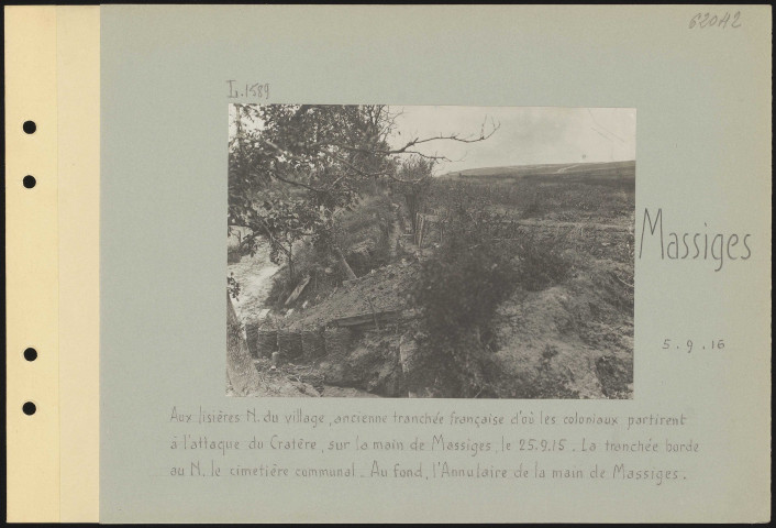 Massiges. Aux lisières nord du village. Ancienne tranchée française d'où les coloniaux partirent à l'attaque du Cratère, sur la Main de Massiges, le 25.9.15. La tranchée borde au nord le cimetière communal. Au fond, l'Annulaire de la Main de Massiges
