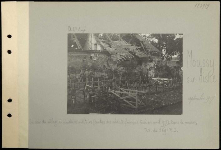 Moussy-sur-Aisne. Un coin du village et cimetière militaire (tombes des soldats français tués en avril 1917). Dans la maison, poste de secours du 369e régiment d'infanterie