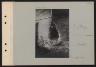 La Poste. Mur troué par un obus