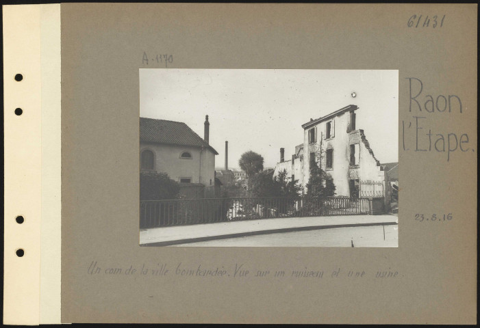 Raon-l'Étape. Un coin de la ville bombardée. Vue sur un ruisseau et une usine