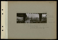 Douai. Place d'Armes. Remise de la croix de guerre à la ville par le président Poincaré. Au fond, le beffroi ; à droite, maisons incendiées par les Allemands en octobre 1918