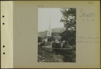 Sewen. L'église et une passerelle sur la rivière