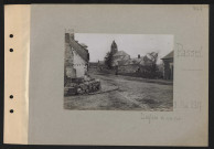 Passel. L'église et une rue