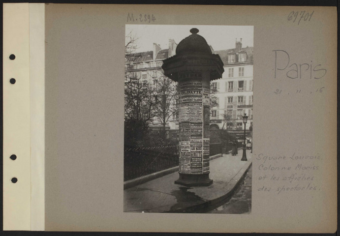 Paris. Square Louvois. Colonne Morris et les affiches des spectacles