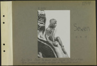 Sewen. Dans l'église. Dépôt des œuvres d'art évacuées du front d'Alsace. Figure provenant des stalles de l'église de Thann, (côté droit)