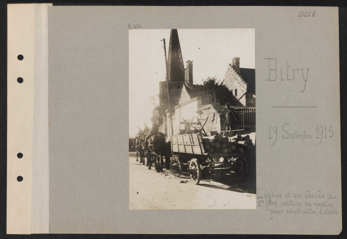 Bitry. L'église et ses abords ; au premier plan, voiture de rondins pour construction d'abris