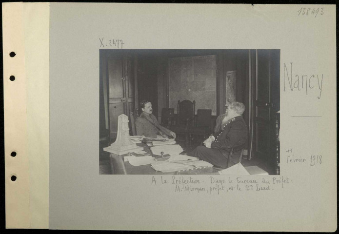 Nancy. À la préfecture. Dans le bureau du préfet : monsieur Mirman, préfet, et le Docteur Laad