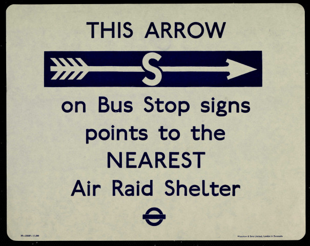 This arrow on Bus Stop signs points the nearest Air Raid Shelter
