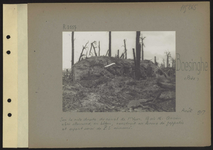 Boesinghe (près). Sur la rive droite du canal de l'Yser. Bois 16. Ancien abri allemand, en bêton, construit en forme de zeppelin et ayant servi de PS ennemi